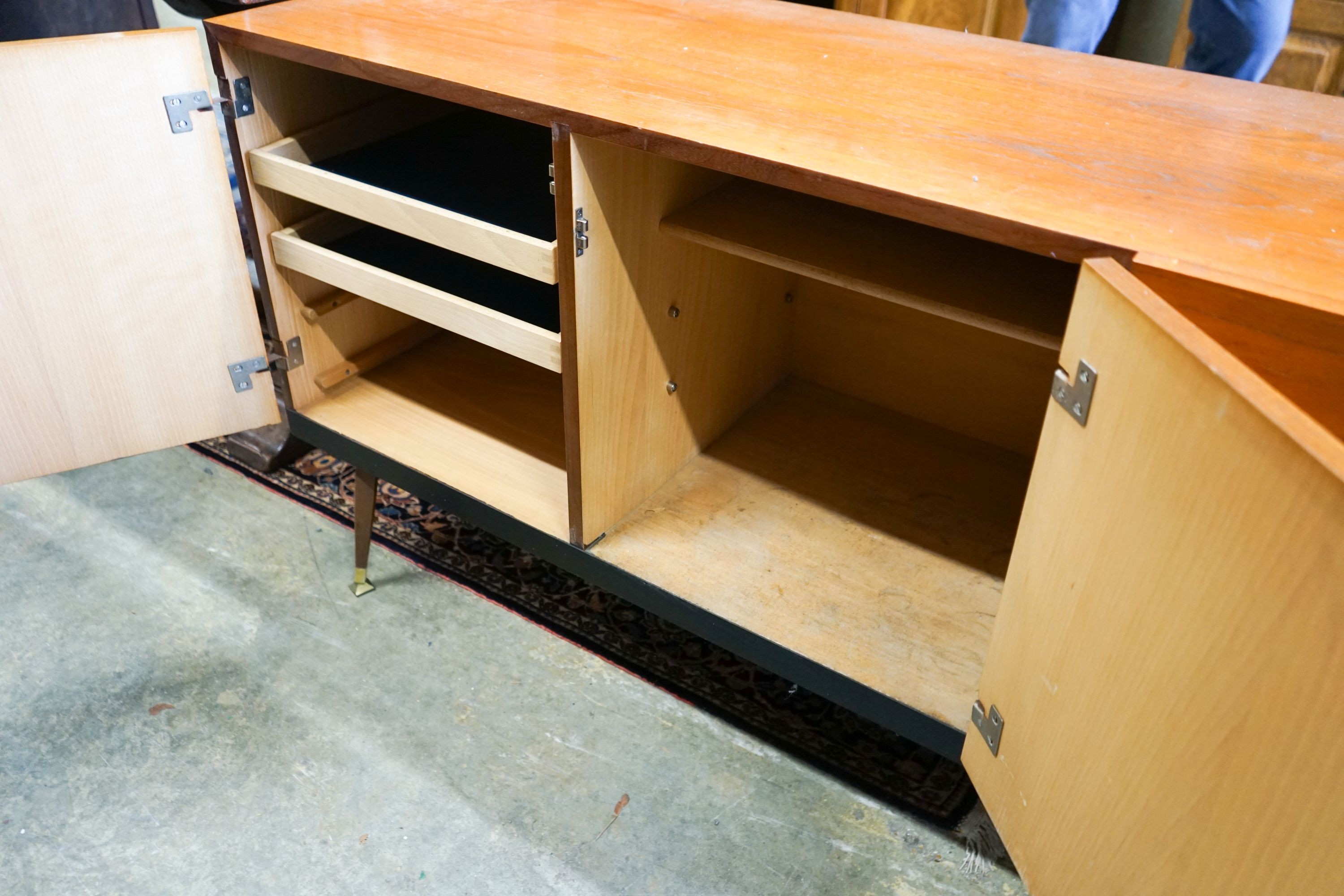 A mid 20th century Stag teak sideboard, length 137cm, depth 48cm, height 73cm